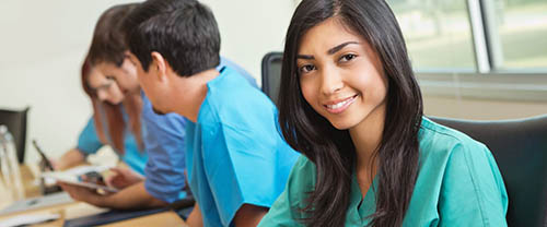 A Nursing Student Smiles Towards the Camera